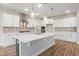 Modern kitchen featuring a large island and stainless steel appliances at 9148 Dupree Meadow Dr # 11, Angier, NC 27501