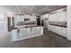 Spacious kitchen with white cabinets and a large island ready for customization at 9148 Dupree Meadow Dr # 11, Angier, NC 27501