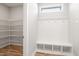 Mudroom features bench with hooks and shoe storage at 9148 Dupree Meadow Dr # 11, Angier, NC 27501