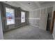 Unfinished room with two windows and drywall at 9148 Dupree Meadow Dr # 11, Angier, NC 27501