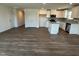 Spacious open-concept kitchen featuring a central island, stainless steel appliances, and modern finishes at 111 Johnson Ridge Way, Four Oaks, NC 27524