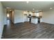 Open-concept kitchen showcases an island, stainless steel appliances, and bright lighting, ideal for gatherings at 111 Johnson Ridge Way, Four Oaks, NC 27524