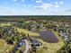 Community overview featuring a golf course and lake at 117 Waterville St, Raleigh, NC 27603