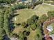 An elevated view of a vacant lot next to a golf course at 117 Waterville St, Raleigh, NC 27603