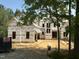 New construction home in progress with visible framing and sheathing on a sunny day at 15 Brandon Pines Ct, Pittsboro, NC 27312