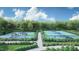 Enjoy outdoor recreation on these well-maintained pickleball courts surrounded by lush landscaping at 2281 Abbeyhill Dr # 136, Raleigh, NC 27610