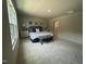 Spacious bedroom features a comfortable bed, bedside tables, and a large window at 259 Johnson Ridge Way, Four Oaks, NC 27524