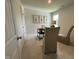 Bedroom featuring plush carpet, a light paint color, and natural light from the window makes for a peaceful and calming space at 259 Johnson Ridge Way, Four Oaks, NC 27524