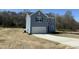 Charming two-story home with a garage and fresh sod in the front yard at 259 Johnson Ridge Way, Four Oaks, NC 27524