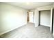 Comfortable bedroom featuring neutral walls, plush carpeting, and ensuite bathroom at 320 Bishop Ln, Sanford, NC 27330