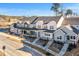 New townhouses with gray and green exterior, front porches, and landscaping at 3939 Willow Gate Way, Knightdale, NC 27604