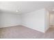 Spacious bedroom with neutral carpeting and ample natural light at 3939 Willow Gate Way, Knightdale, NC 27604