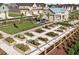 Community garden with raised garden beds and walking paths at 3939 Willow Gate Way, Knightdale, NC 27604