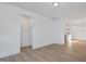 Open concept dining area with hardwood floors and access to kitchen at 3939 Willow Gate Way, Knightdale, NC 27604