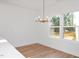 Dining area with hardwood floors and a chandelier at 3939 Willow Gate Way, Knightdale, NC 27604
