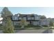 New three-unit townhome development with gray siding and modern design at 3939 Willow Gate Way, Knightdale, NC 27604