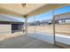 Screened-in porch with views of the backyard and neighboring homes at 1829 Hydrangea Way, Fuquay Varina, NC 27526