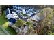 Aerial view of a residential neighborhood showing roof tops and landscaping at 2007 Opulent Oaks Ln # 24, Durham, NC 27713