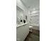 Clean bathroom with a white tub/shower combo, single vanity, and neutral decor at 2007 Opulent Oaks Ln # 24, Durham, NC 27713