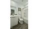 Clean bathroom with white vanity and bathtub at 2007 Opulent Oaks Ln # 24, Durham, NC 27713