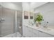 Modern bathroom with a double vanity, large shower, and stylish finishes at 2007 Opulent Oaks Ln # 24, Durham, NC 27713