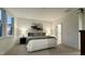 Cozy bedroom with a queen-size bed, window, and access to a private bathroom at 2007 Opulent Oaks Ln # 24, Durham, NC 27713