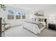 Bedroom features a large window, comfortable bed, and stylish decor at 2007 Opulent Oaks Ln # 24, Durham, NC 27713