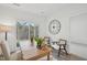 Bright dining room with wood floors and sliding glass doors to the outdoor living space at 2007 Opulent Oaks Ln # 24, Durham, NC 27713