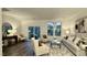 Spacious living room with comfy seating, a coffee table, and access to a deck at 2007 Opulent Oaks Ln # 24, Durham, NC 27713