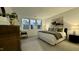 Large main bedroom with a comfortable bed, ample natural light and a window seat at 2007 Opulent Oaks Ln # 24, Durham, NC 27713