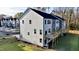 Side view of modern townhouse with deck at 2007 Opulent Oaks Ln # 24, Durham, NC 27713