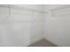 Empty walk-in closet with carpet and wire shelving at 2007 Opulent Oaks Ln # 24, Durham, NC 27713