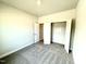 Nice bedroom featuring neutral walls, gray carpet, and an adjoining closet at 214 Drayton Hall Ln, Sanford, NC 27330