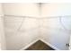 Spacious walk-in closet with carpet flooring and metal shelving at 214 Drayton Hall Ln, Sanford, NC 27330