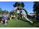 Multi-level outdoor playground with slides for children to enjoy at 214 Drayton Hall Ln, Sanford, NC 27330