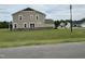 Lovely two-story home features a stone accent and a spacious lawn at 224 Bering Cir, Angier, NC 27501