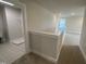Hallway view from a second floor level, carpet floors, and nearby bathroom at 224 Bering Cir, Angier, NC 27501