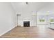 Spacious living room with a fireplace, and lots of natural light at 32 Boyce Ct, Sanford, NC 27332