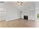 Spacious living room with a fireplace, and lots of natural light at 32 Boyce Ct, Sanford, NC 27332