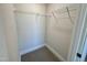 Walk-in closet with metal shelving for organized storage at 225 Bering Cir, Angier, NC 27501