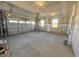 Spacious two-car garage with natural light and ample room for vehicles and storage at 225 Bering Cir, Angier, NC 27501