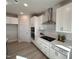 Bright kitchen featuring stainless steel appliances, and white cabinetry at 225 Bering Cir, Angier, NC 27501