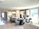 Open concept dining area flows into the kitchen at 225 Bering Cir, Angier, NC 27501