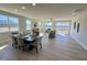 Bright and airy living space with lake views, dining area, and an inviting screened porch at 225 Bering Cir, Angier, NC 27501