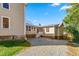 Back of a charming two-story home showing a connecting walkway to another building at 2416 Glencoe St, Burlington, NC 27217