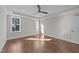 Bright, spacious bedroom with hardwood flooring, neutral paint, and ample natural light at 25 Firefly Ln, Youngsville, NC 27596