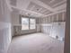 Unfinished bedroom with a window to a scenic view at 105 Blackmon Ridge Ct # 15, Fuquay Varina, NC 27526