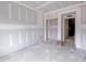 Unfinished room with view to hallway, showcasing potential layout, under construction at 105 Blackmon Ridge Ct # 15, Fuquay Varina, NC 27526