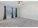 Spacious bedroom with carpeted floor, window with shutters, and ceiling fan at 321 Masden Rd, Holly Springs, NC 27540