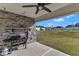Outdoor patio with Blackstone griddle and backyard view at 616 Silver Comet Dr, Knightdale, NC 27545